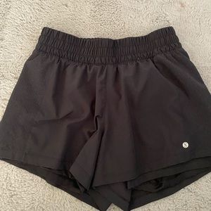 Black athletic running shorts